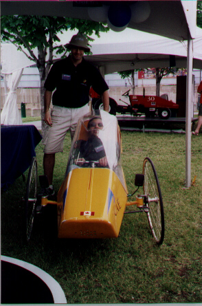 Thats me in the Super Mileage Vehicle. This picture was taken during the COFIQ EXPOTECH in June 2000, my friend Mario(guy standing) and I manned Concordia's booth